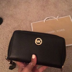 Michael Kors zip wallet super cute and sleek